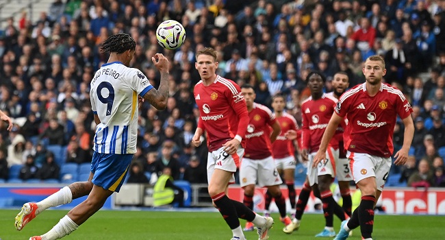 Brighton’s Brazilian striker #09 Joao Pedro headers the ball to scores the team’s second goal during the English Premier League football match between Brighton and Hove Albion and Manchester United at the American Express Community Stadium in Brighton, southern England on August 24, 2024.